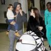 Kourtney Kardashian, Scott Disick et leurs enfants Mason et Penelope arrivent à l'aéroport de Los Angeles. Le 8 janvier 2012.