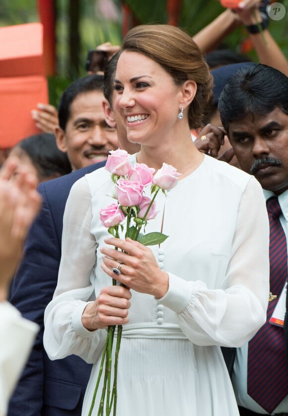 La duchesse Catherine de Cambridge, lorsqu'elle sourit (et c'est souvent le cas, comme ici en visite en Malaisie le 14 septembre 2012), dévoile en moyenne... 8,6 dents, selon les observations minutieuses du Vogue UK de février 2013.