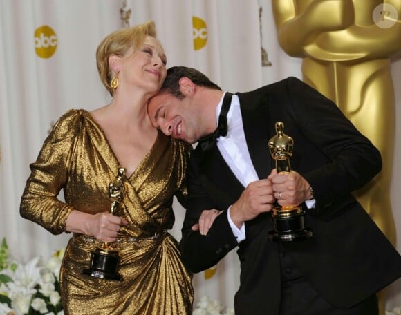 Meryl Streep et Jean Dujardin lors des Oscars, à Los Angeles, le 26 février 2012.