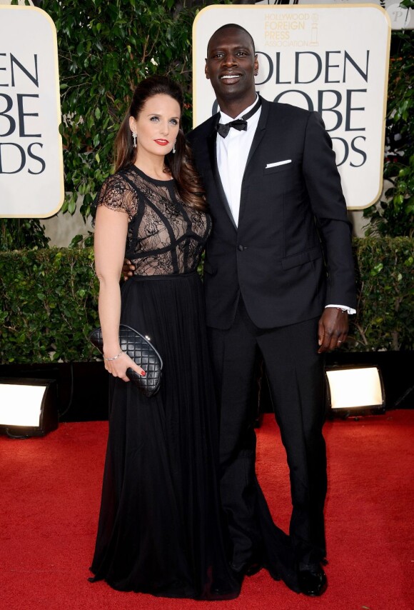 Omar Sy discret avec sa femme lors des Golden Globes, le 13 janvier 2013.