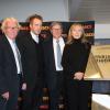 Françoise Boulain, son fils Gary Roland, Jean-Michel Larqué et Jacques Vendroux lors de l'inauguration de la tribune de presse du Stade de France qui portera désormais le nom de Thierry Roland, le 6 février 2013