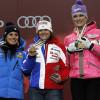 Marion Rolland accompagnée sur le podium de Nadia Fanchini et Maria Höfl-Riesch est devenue championne du monde de descente à Schladming en Autriche le 10 février 2013