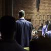 Oscar Pistorius dans la salle d'audience du tribunal d'instance de Pretoria, le 15 février 2013.