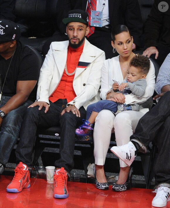 Swizz Beatz, Alicia Keys et leur petit garçon Egypt lors du All-Star Game qui se déroulait au Toyota Center de Houston le 17 février 2013