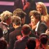 Exclusif - Le groupe One Direction (Harry Styles, Niall Horan, Louis Tomlinson, Zayn Malik, Liam Payne) à table accompagnés de James Corden lors de la cérémonie des BRIT Awards à Londres, le 20 février 2013.