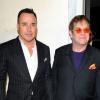 David Furnish et Elton John assistent au cocktail de bienfaisance de Tom Ford dans sa boutique à Beverly Hills. Le 21 février 2013.
