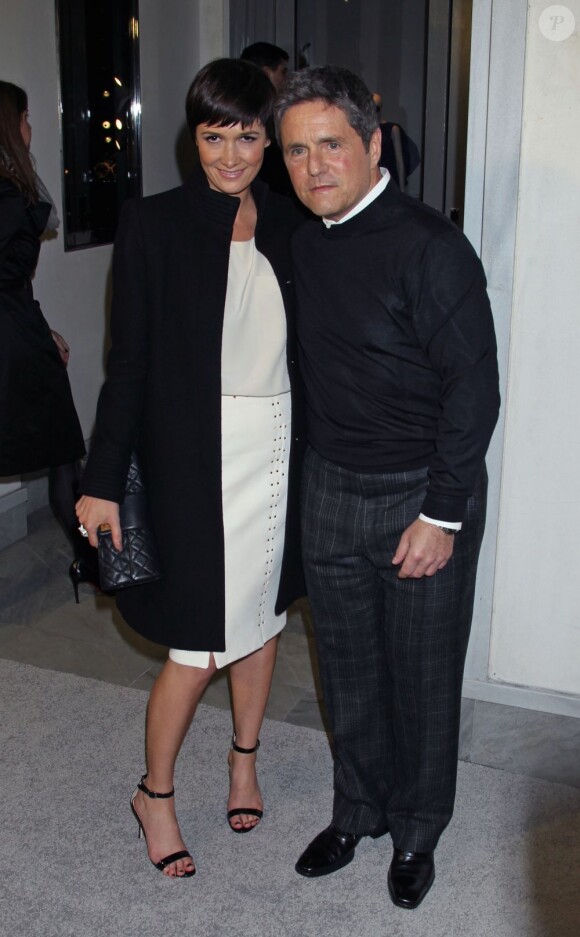 Le PDG de Paramount Studios Brad Grey et sa femme Cassandra Huysentruyt assistent au cocktail de bienfaisance de Tom Ford dans sa boutique à Beverly Hills. Le 21 février 2013.