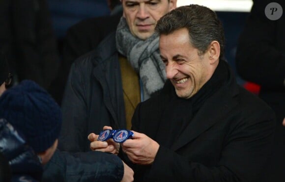 Nicolas Sarkozy lors du match entre le Paris Saint-Germain et l'Olympique de Marseille (2-0) au Parc des Princes à Paris le 24 février 2013