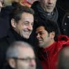 Nicolas Sarkozy et Jamel Debbouze lors du match entre le Paris Saint-Germain et l'Olympique de Marseille (2-0) au Parc des Princes à Paris le 24 février 2013