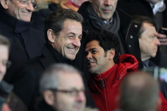 Nicolas Sarkozy et Jamel Debbouze lors du match entre le Paris Saint-Germain et l'Olympique de Marseille (2-0) au Parc des Princes à Paris le 24 février 2013