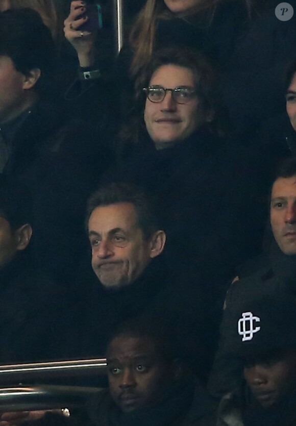 Jean et Nicolas Sarkozy lors du match entre le Paris Saint-Germain et l'Olympique de Marseille (2-0) au Parc des Princes à Paris le 24 février 2013