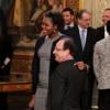 François Hollande et Isabelle Yacoubou lors de la cérémonie de remise de la Légion d'honneur aux sportifs médaillés à Londres lors des Jeux olympiques, au palais de l'Elysée le 1er mars 2013 à Paris