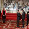 Valérie Trierweiler, Francois Hollande et Tony Estanguet lors de la cérémonie de remise de la Légion d'honneur aux sportifs médaillés à Londres lors des Jeux olympiques, au palais de l'Elysée le 1er mars 2013 à Paris