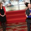 Valérie Trierweiler et François Hollande lors de la cérémonie de remise de la Légion d'honneur aux sportifs médaillés à Londres lors des Jeux olympiques, au palais de l'Elysée le 1er mars 2013 à Paris