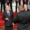François Hollande et Teddy Riner lors de la cérémonie de remise de la Légion d'honneur aux sportifs médaillés à Londres lors des Jeux olympiques, au palais de l'Elysée le 1er mars 2013 à Paris
