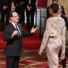 François Hollande et Sandrine Gruda lors de la cérémonie de remise de la Légion d'honneur aux sportifs médaillés à Londres lors des Jeux olympiques, au palais de l'Elysée le 1er mars 2013 à Paris
