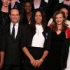 Valérie Trierweiler et François Hollande encadrent Emmeline Ndongue lors de la cérémonie de remise de la Légion d'honneur aux sportifs médaillés à Londres lors des Jeux olympiques, au palais de l'Elysée le 1er mars 2013 à Paris