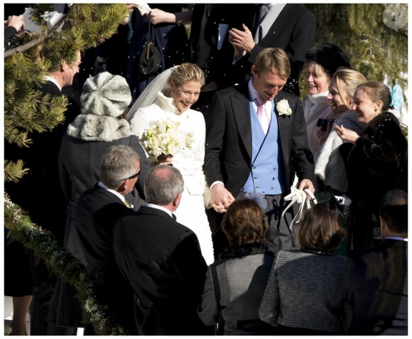 Le prince William et la duchesse de Cambridge Kate Middleton, enceinte, assistent au mariage de Laura Bechtolsheimer avec Mark Tomlinson, ici à la sortie du temps protestant, à Arosa en Suisse, le 2 mars 2013.