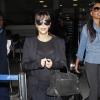 Kim Kardashian arrive à l'aéroport de Los Angeles. Le 17 mars 2013.