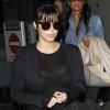 Kim Kardashian arrive à l'aéroport de Los Angeles. Le 17 mars 2013.