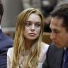 Lindsay Lohan durant son procès devant la cour de justice de Los Angeles, le 18 mars 2013. L'actrice de 26 ans, accompagnée de son avocat Mark Heller, a échappé à la prison mais pas à la cure de rehab.