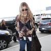 Fergie, enceinte, prend l'avion a Los Angeles à destination de New York, le 20 mars 2013.