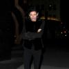Liberty Ross, tout en noir, et son nouveau compagnon Jimmy Iovine après un dîner romantique à Beverly Hills. Le 23 mars 2013.