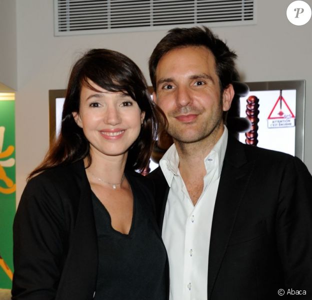 Christophe Michalak et sa compagne Delphine McCarty, à la soirée Mikado King Choco au concept store Colette store, à Paris le 24 mai 2012.
