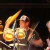 Lance Armstrong en plein effort lors d'un concert du groupe Lance Herbstrong, fondé par trois de ses amis, lors d'un festival à Austin le 20 avril 2013