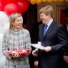 Le prince des Pays-Bas Willem-Alexander et la princesse Maxima, duo souriant pour donner le coup d'envoi des Jeux du Roi. Enschede, le 26 avril 2013.