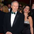 Clint Eastwood et sa femme Dina Ruiz lors des Oscars 2005