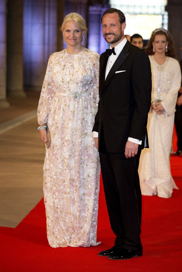 La princesse Mette-Marit et le prince Haakon de Norvège au Rijksmuseum d'Amsterdam le 29 avril 2013 pour le dîner d'adieu de la reine Beatrix des Pays-Bas, à la veille de son abdication.