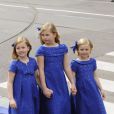 Les princesses Catharina-Amalia (9 ans), Alexia (7 ans) et Ariane (6 ans), filles du roi Willem-Alexander des Pays-Bas et de la reine Maxima à leur arrivée à la Nouvelle Eglise d'Amsterdam pour la prestation de serment de Willem-Alexander, le 30 avril 2013.