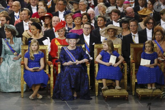 Les princesses Catharina-Amalia (9 ans), Alexia (7 ans) et Ariane (6 ans), filles du roi Willem-Alexander et de la reine Maxima des Pays-Bas, à la Nouvelle Eglise d'Amsterdam lors de la prestation de serment de Willem-Alexander, le 30 avril 2013.