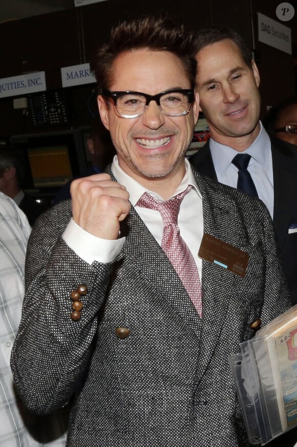 Robert Downey Jr. fier d'avoir ouvert la Bourse au New York Stock Exchange de Wall Street, New York, le 30 avril 2013.