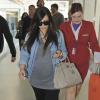 Kim Kardashian, enceinte, à la sortie de son hôtel à Londres, le 2 mai 2013.