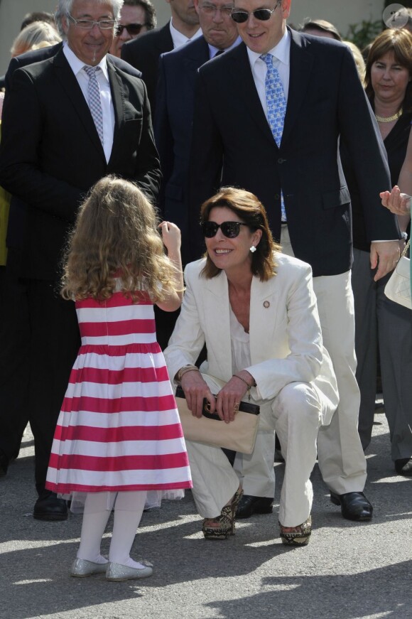 La princesse Caroline de Hanovre et le prince Albert de Monaco à la 46e exposition du concours de bouquets de fleurs à Monaco le 4 mai 2013.