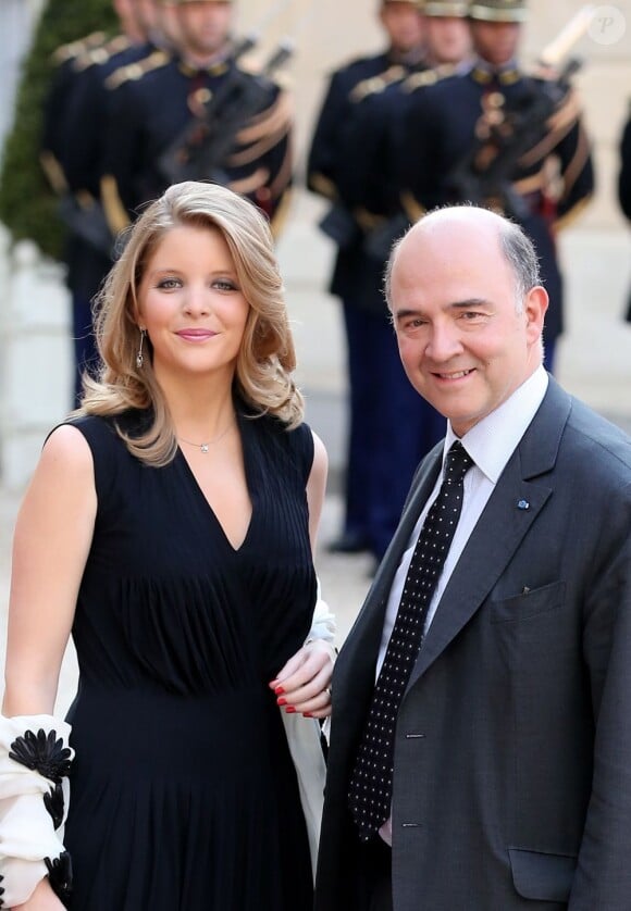 Pierre Moscovici et sa compagne Marie-Charline Pacquot lors d'un dîner d'Etat à l'Elysee en l'honneur du président polonais Bronislaw Komorowski, le 7 mai 2013.