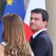 Manuel Valls et sa femme Anne Gravoin lors d'un dîner d'Etat à l'Elysee en l'honneur du président polonais Bronislaw Komorowski, le 7 mai 2013.