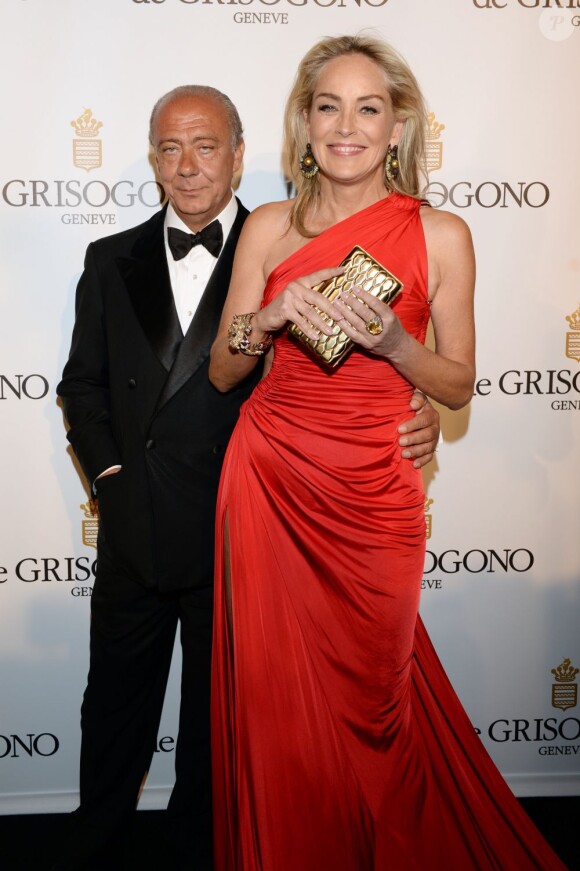 Fawaz Gruosi et Sharon Stone lors du photocall de la soirée "de Grisogono", marque de bijoux et de montres de luxe, à l'Eden Roc au Cap d'Antibes dans le cadre du 66e Festival de Cannes. Le 21 mai 2013.