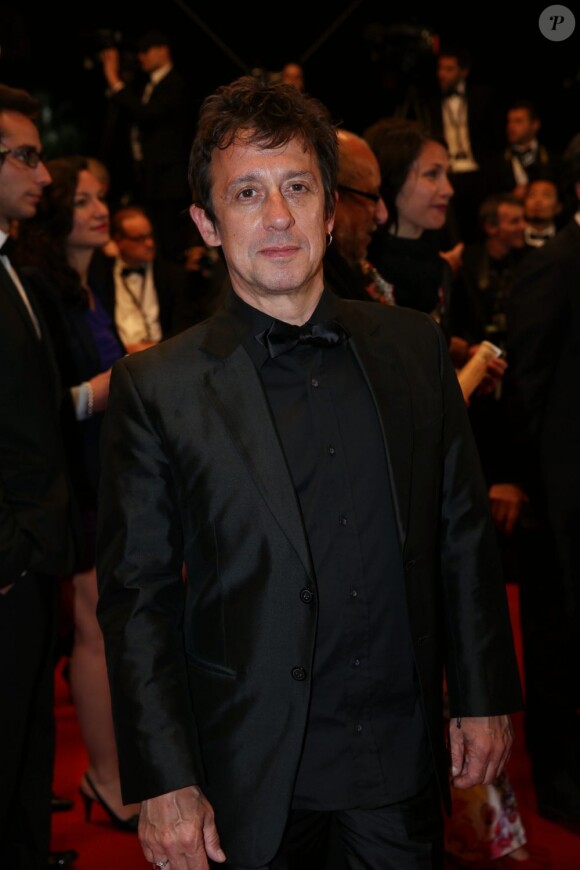 Eric Serra lors de la montée des marches du film Only God Forgives lors du 66e Festival du film de Cannes, le 22 mai 2013