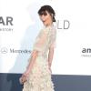 Milla Jovovich - Photocall de la soirée "Amfar's 20th Cinema Against AIDS" à l'Eden Roc au Cap d'Antibes lors du 66e Festival de Cannes. Le 23 mai 2013.