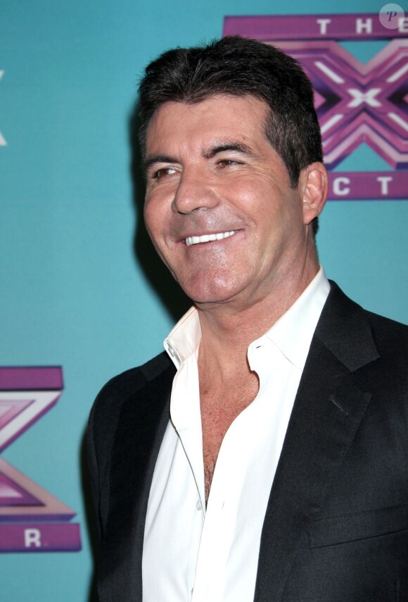 Simon Cowell au photocall de la finale de la saison 2 de l'émission X Factor à Los Angeles, le 20 décembre 2012.