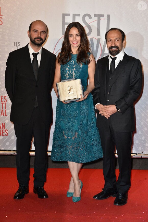 Ali Mosaffa, Bérénice Bejo et Asghar Farhadi au dîner des lauréats au Festival de Cannes le 26 mai 2013.