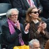 Jean Rochefort et sa femme Françoise dans les tribunes de Roland-Garros au cinquième jour des Internationaux de France le 30 mai 2013