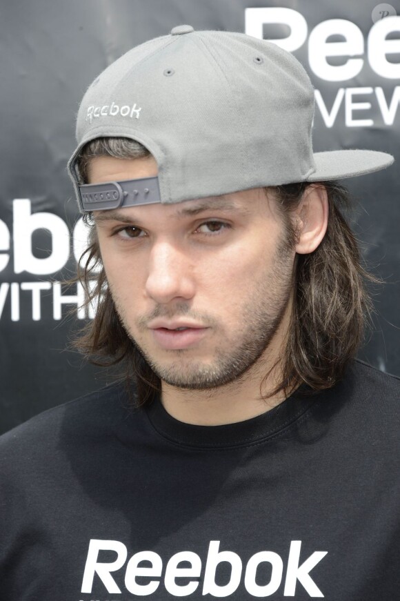 Le chanteur Orelsan à l'occasion du "Reebok Live With Fire Tour" sur le parvis de la Défense à Paris, le 4 mai 2013.