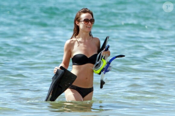Olivia Wilde et son fiancé Jason Sudeikis en vacances à Maui sur l'ile d'Hawai le 29 mai 2013. L'actrice fait du paddle board avant d'admirer les fonds marins.