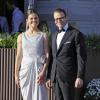 La princesse Victoria de Suède et le prince Daniel arrivant au Grand Hotel de Stockholm le 7 juin 2013 pour le dîner privé offert à l'occasion du mariage de la princesse Madeleine et de Chris O'Neill.