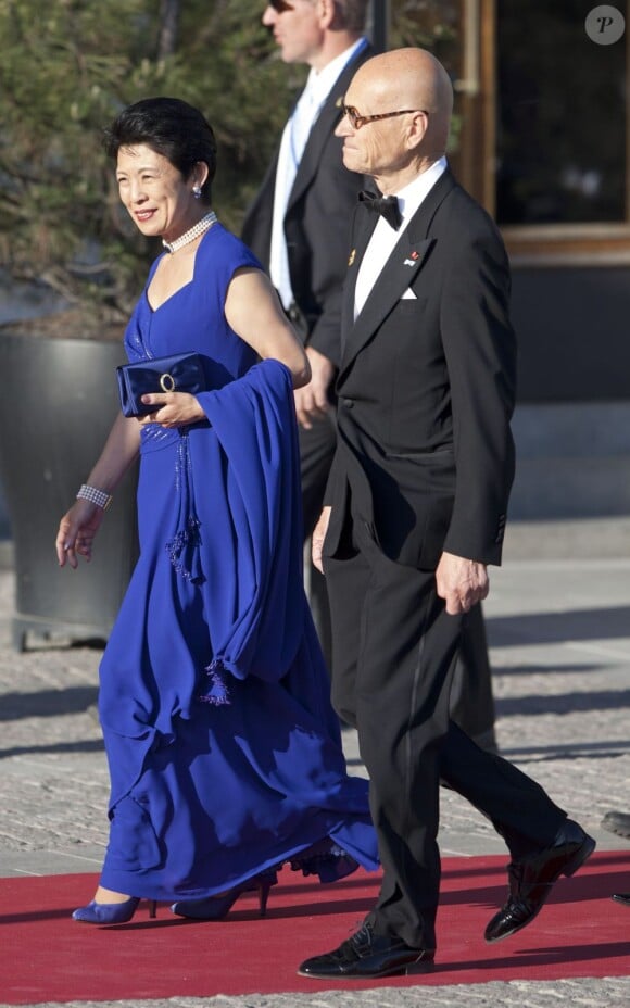 La princesse Takamado du Japon arrivant au Grand Hotel de Stockholm le 7 juin 2013 pour le dîner privé offert à l'occasion du mariage de la princesse Madeleine et de Chris O'Neill.
