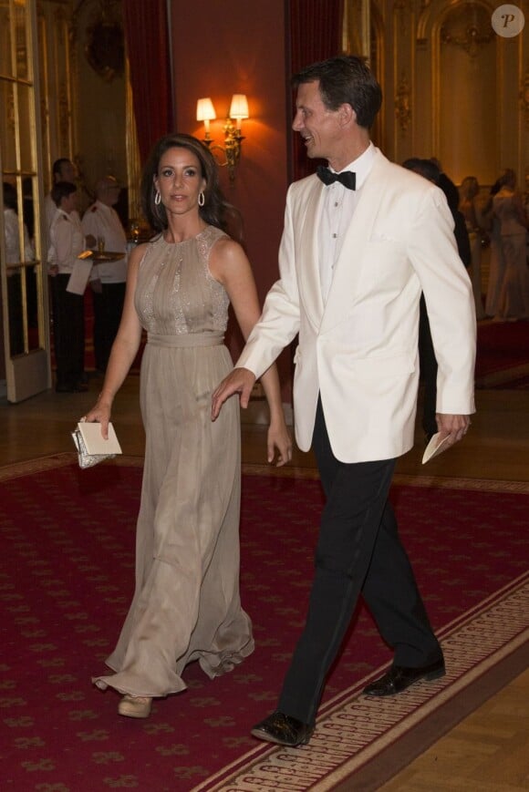 La princesse Marie et le prince Joachim de Danemark au Grand Hotel de Stockholm le 7 juin 2013 pour le dîner privé offert à l'occasion du mariage de la princesse Madeleine et de Chris O'Neill.